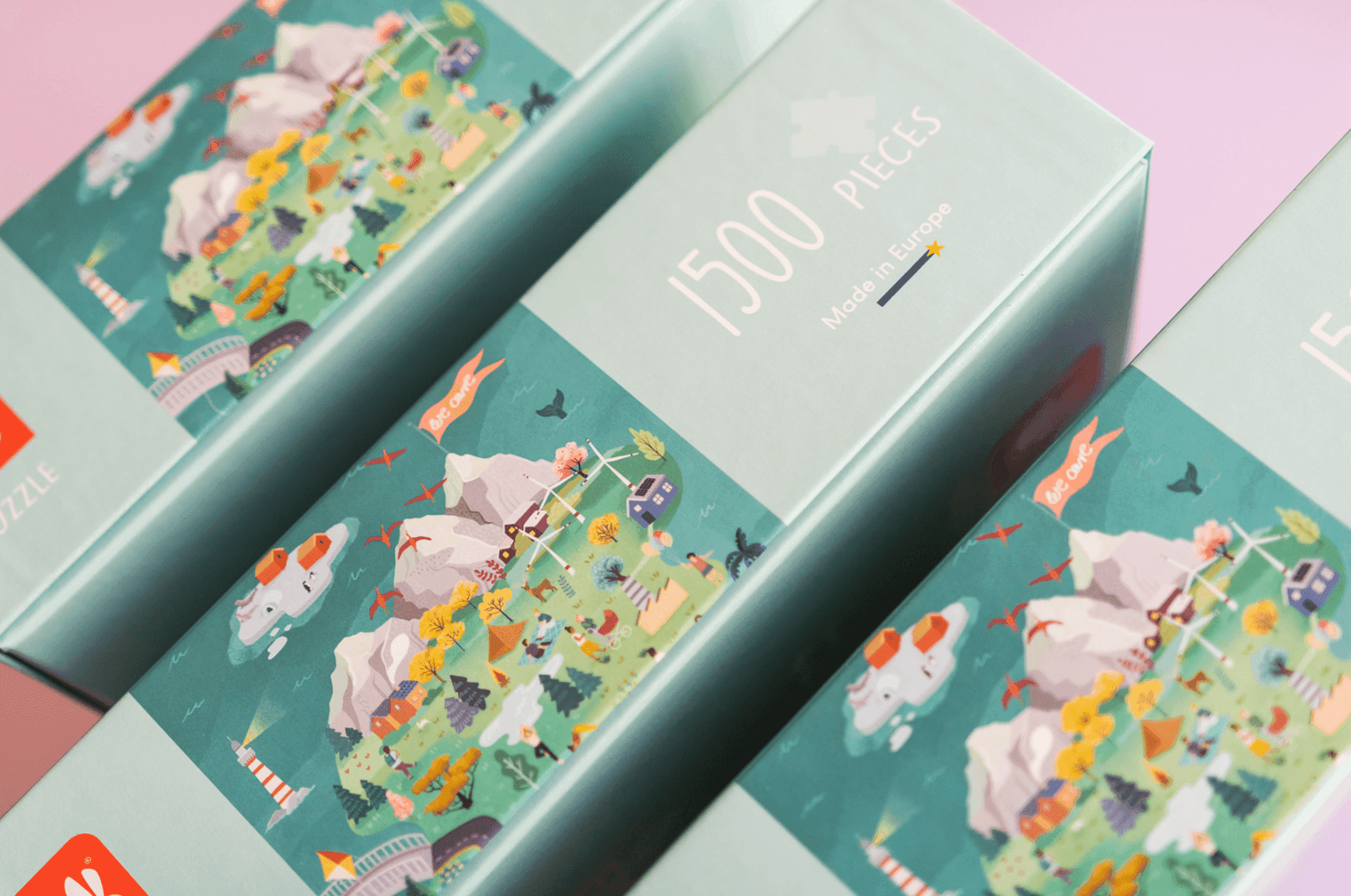 Cajas de puzzles de 1500 piezas con paisajes ilustrados a color de montañas, aerogeneradores, lagos y bosques en estilo cartoon. El packaging indica fabricación en Europa.