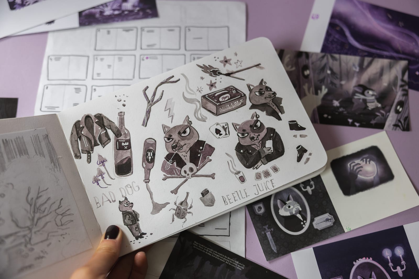 Livre Mugo's Universe photographié ouvert, détail des illustrations par Asia Orlando.